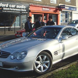 The SL outside Oxford Car Audio, 01.12.12, with Yasuyuki Goto (Alpine Europe Product Manager based in Munich), Takayuki Tamura (Alpine After Market En